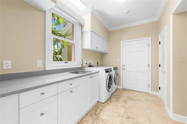 a front view of a house with yard and glass windows