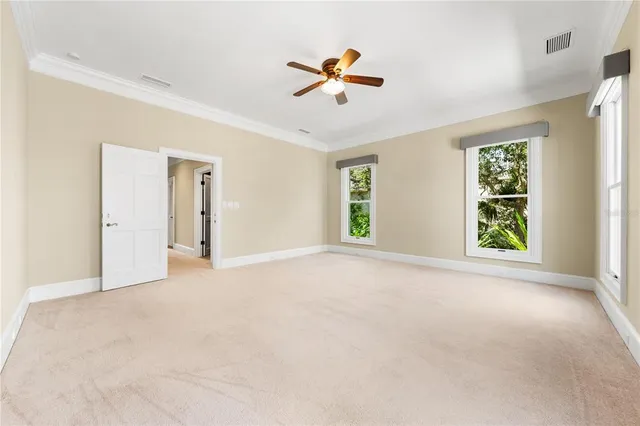 a view of a livingroom with furniture and a gym equipment