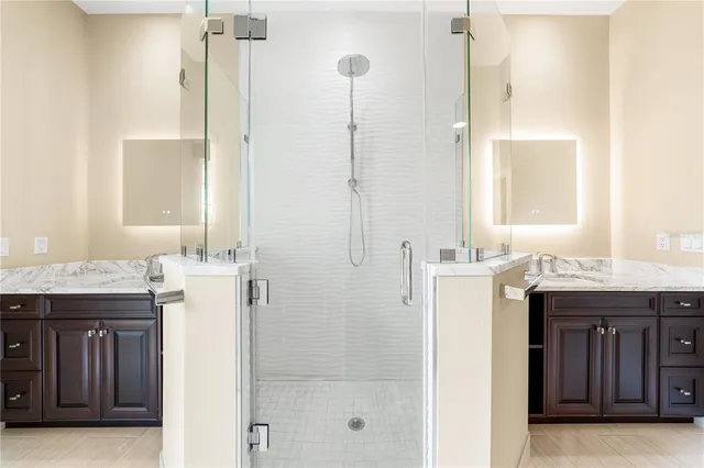 a view of an empty room and wooden floor