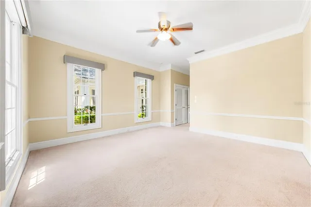 a view of a backyard with sitting area