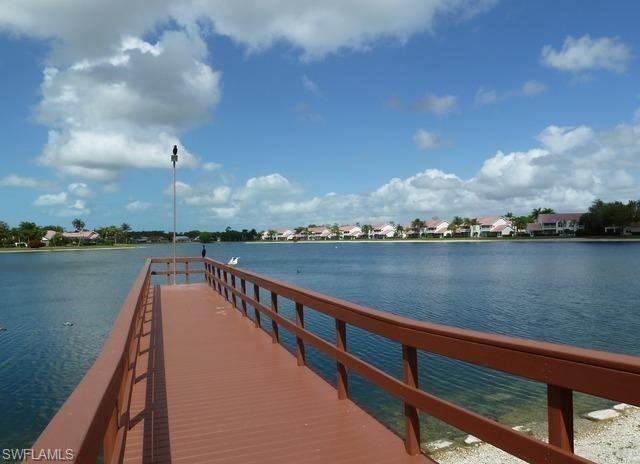 960 Partridge Circle, Unit 1202 Naples, FL 34104 - Photo 21 of 23 a view of lake
