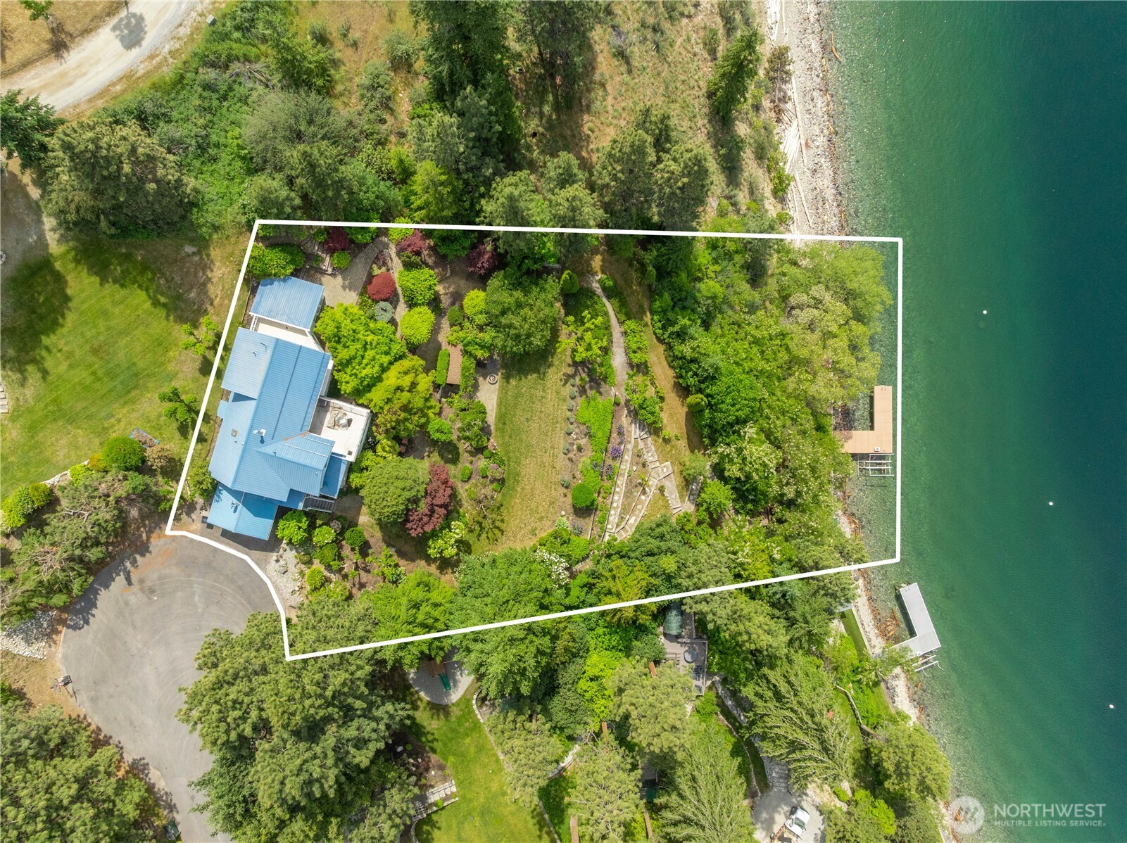 141 Sunset Place Manson, WA 98831 - Photo 2 of 38 a balcony with lots of green space
