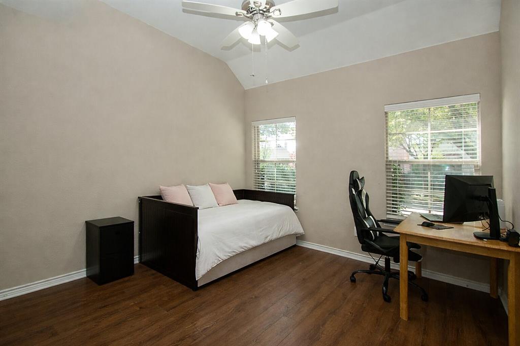 9754 Boyton Canyon Road Frisco, TX 75035 - Photo 15 of 21 a view of a workspace with furniture and a window
