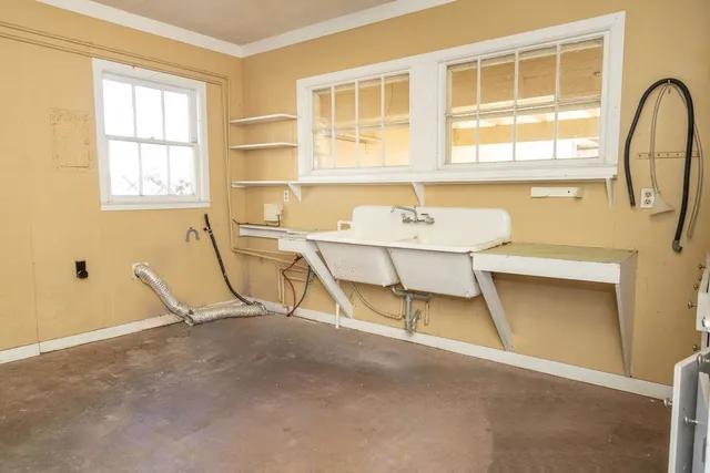 a room with table and windows