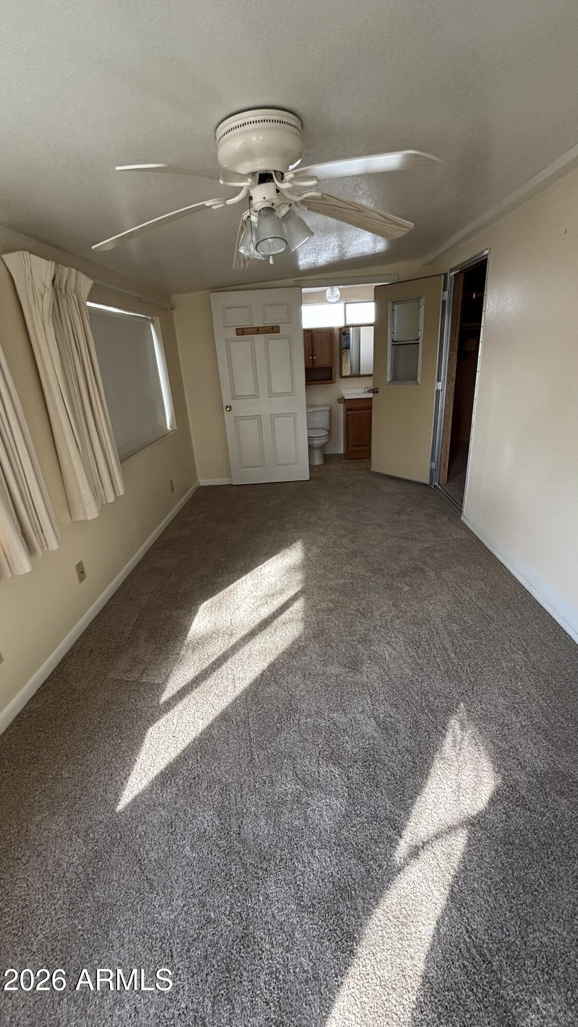 17200 West Bell Road, Unit 2195 Surprise, AZ 85374 - Photo 14 of 27 a view of a hallway with stairs