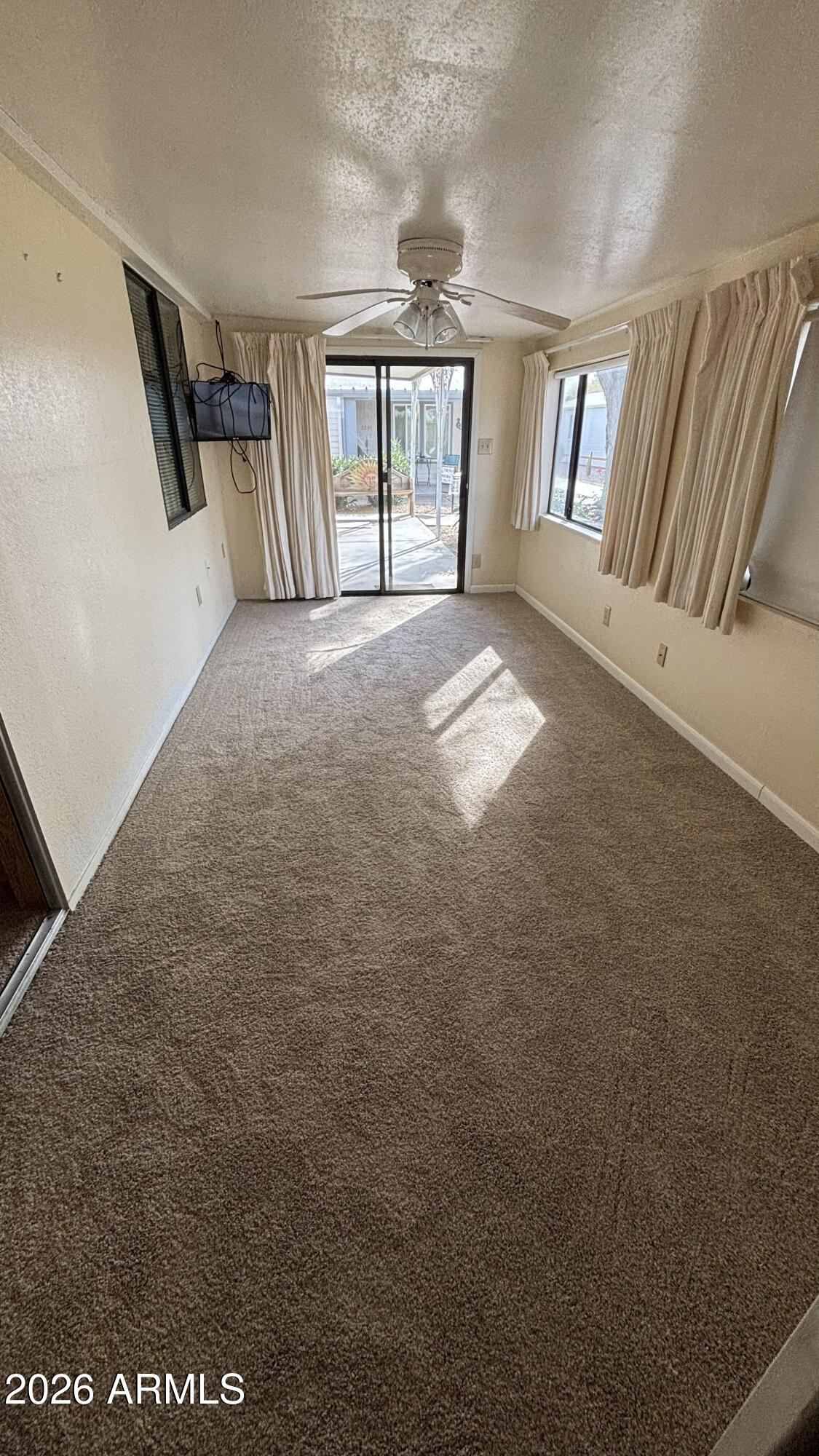 17200 West Bell Road, Unit 2195 Surprise, AZ 85374 - Photo 15 of 27 a view of livingroom with furniture and windows