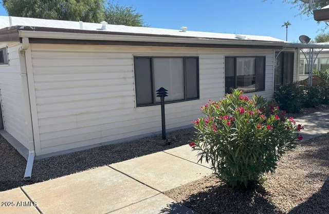 a view of a house with a porch