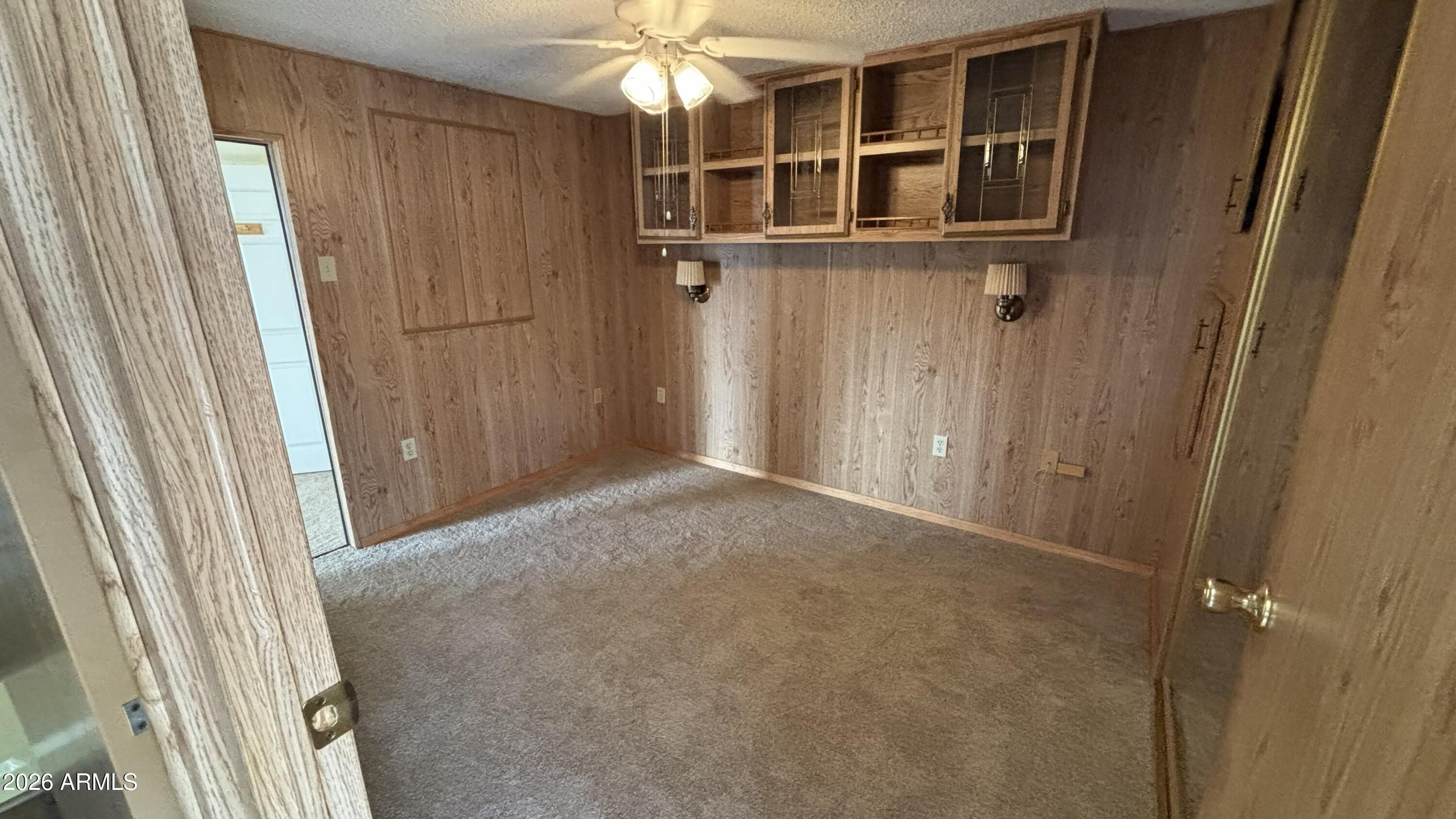 17200 West Bell Road, Unit 2195 Surprise, AZ 85374 - Photo 22 of 27 a view of a hallway with wooden floor