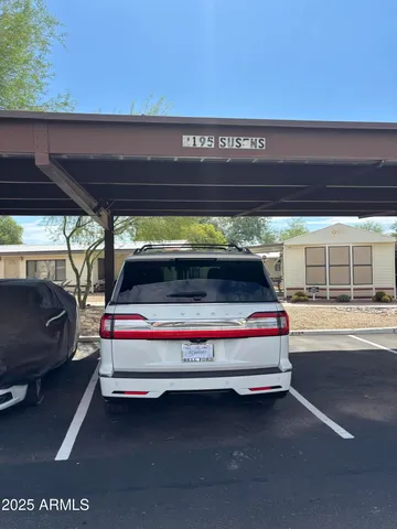 a view of balcony with furniture