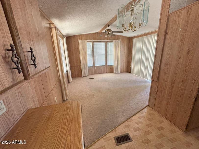 17200 West Bell Road, Unit 2195 Surprise, AZ 85374 - Photo 7 of 16 a view of a bedroom with wooden floor and windows
