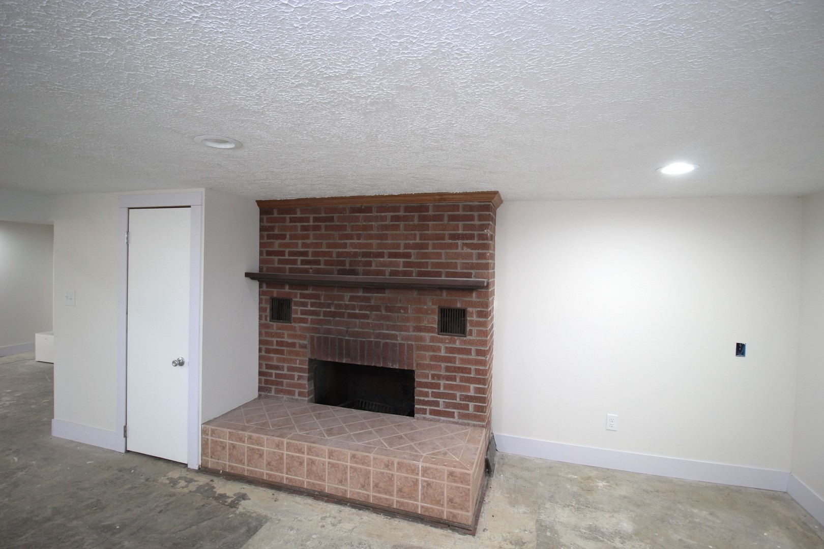 108 East Gridley Road Gridley, IL 61744 - Photo 18 of 22 a living room with a fireplace