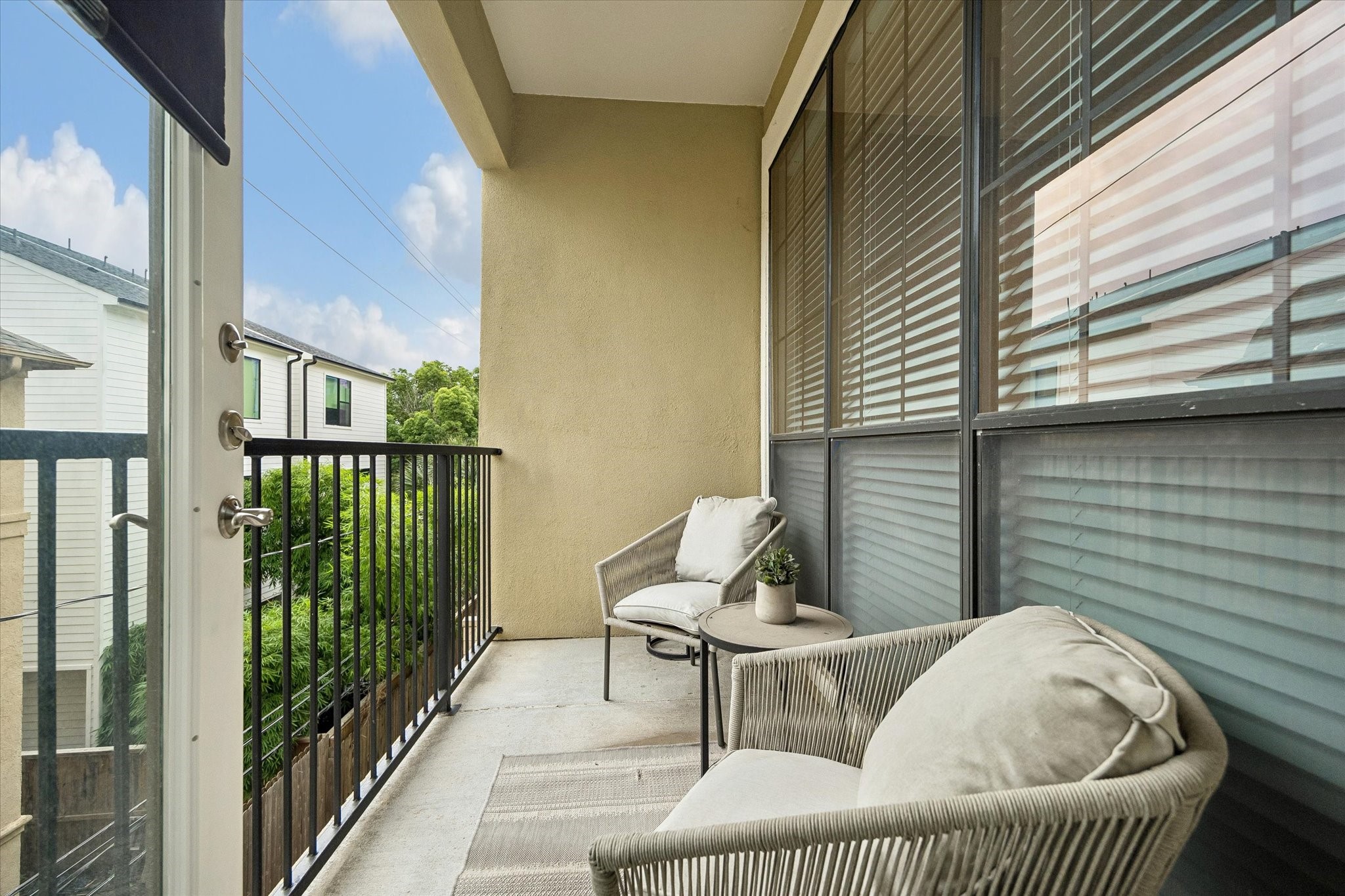 2120 Kipling Street, Unit 304 Houston, TX 77098 - Photo 12 of 24 The private balcony creates an easy extension of the living space and offers the perfect spot for morning coffee or evening relaxation. Accessible directly from the main living area, it adds to the home’s comfortable indoor-outdoor flow.
