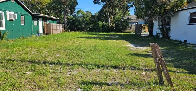 a view of backyard with green space