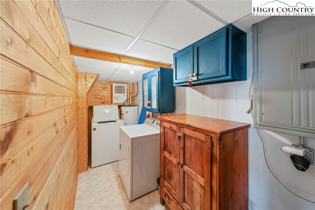 196 Eagle Nest Road Purlear, NC 28665 - Photo 25 of 36 a utility room with sink dryer and washer