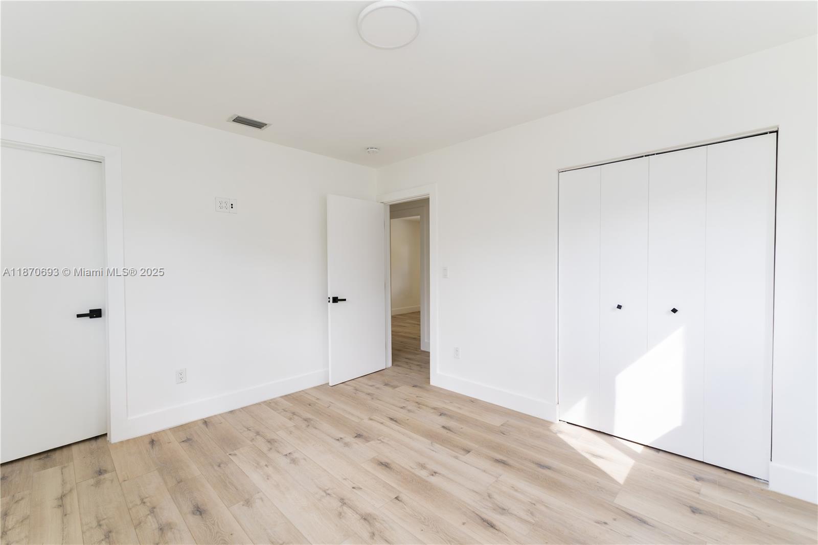 10441 Southwest 50th Terrace Miami, FL 33165 - Photo 17 of 19 a view of an empty room