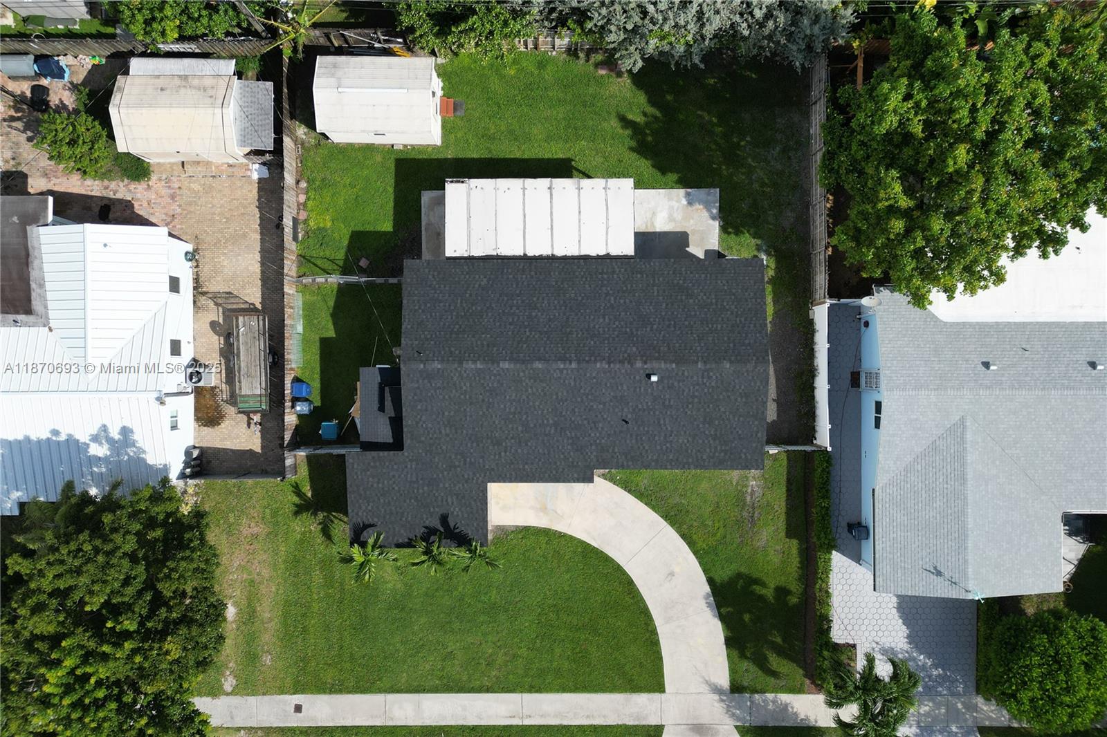 10441 Southwest 50th Terrace Miami, FL 33165 - Photo 4 of 19 an aerial view of residential houses with outdoor space and parking