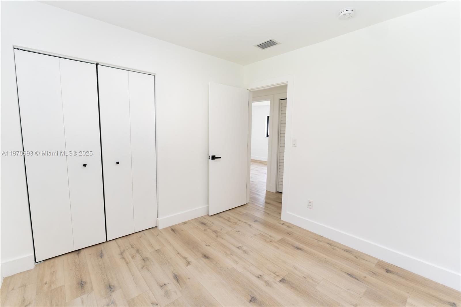 10441 Southwest 50th Terrace Miami, FL 33165 - Photo 10 of 19 a view of an empty room