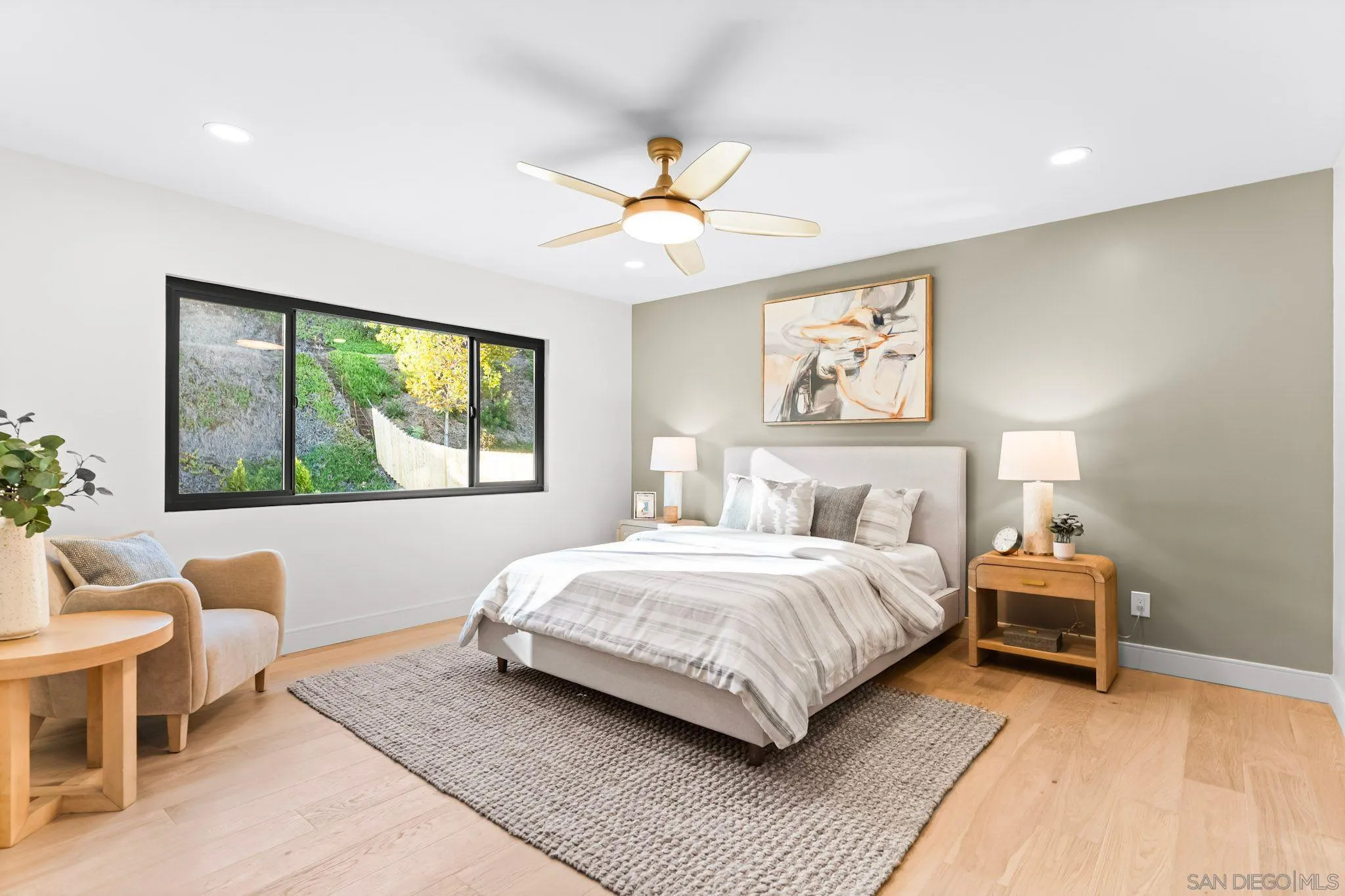 13334 Barbados Way Del Mar, CA 92014 - Photo 13 of 31 a bedroom with a large bed and a window