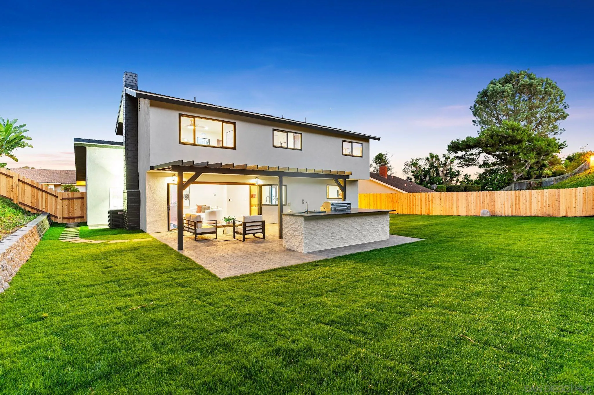 13334 Barbados Way Del Mar, CA 92014 - Photo 3 of 31 a view of an house with backyard porch and garden