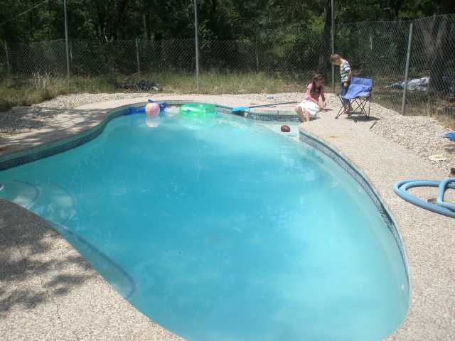 21101 Hogeye Road, Unit 3 Manor, TX 78653 - Photo 1 of 1 a view of swimming pool from a lake view
