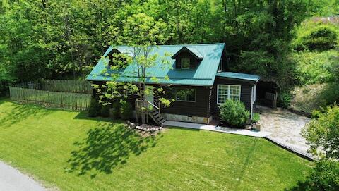 182 Rose Road Newport, VA 24128 - Photo 4 of 69 a view of a house with a yard and potted plants