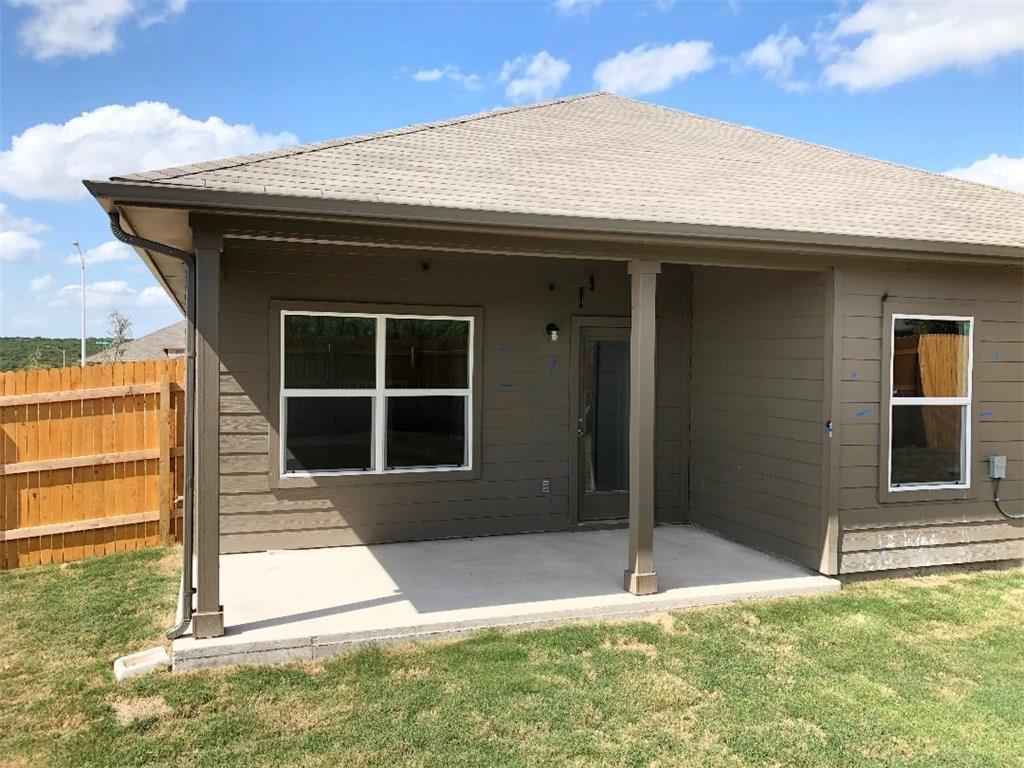 10801 Defender Trail Austin, TX 78754 - Photo 10 of 11 a house with yard in front of it