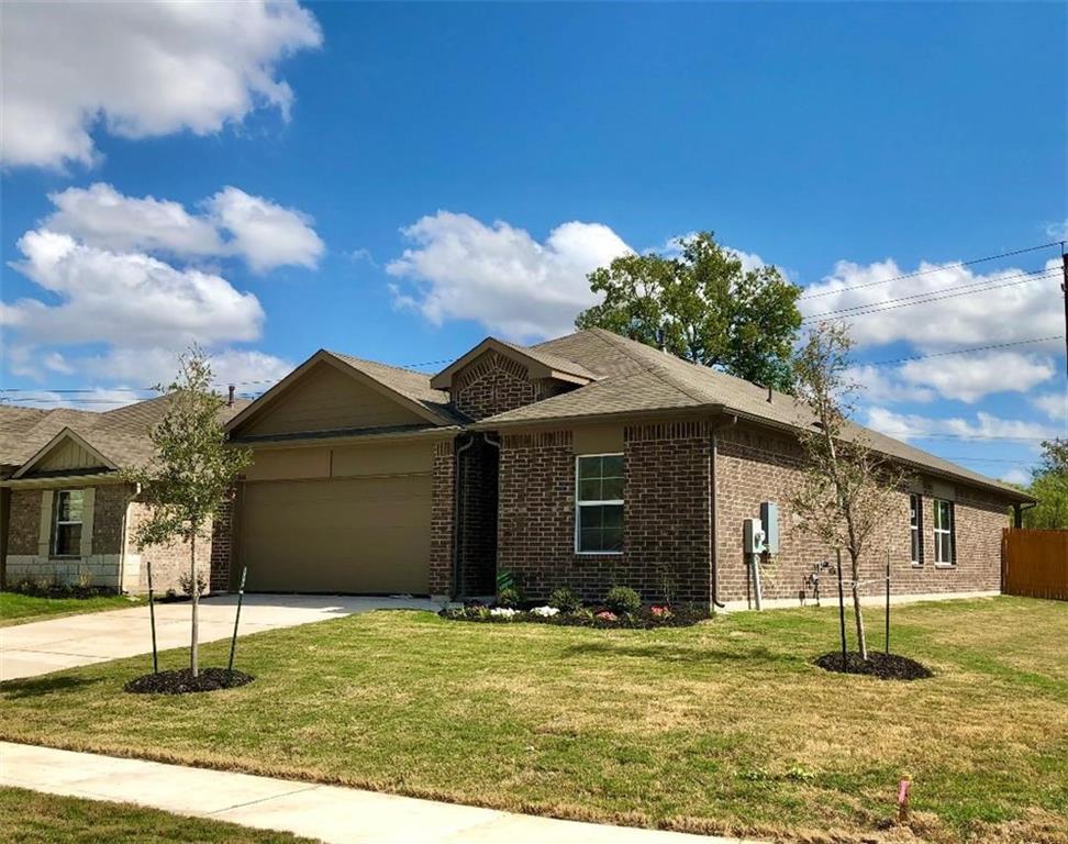 10801 Defender Trail Austin, TX 78754 - Photo 2 of 11 a front view of a house with a yard
