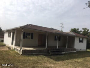1825 North Wade Wiley Road Union City, TN 38261 - Photo 1 of 1 a front view of a house