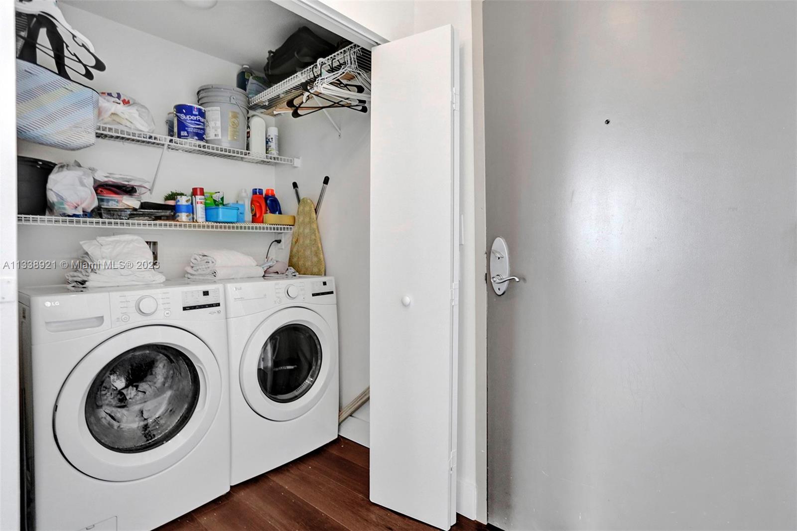 2001 Biscayne Boulevard, Unit 2202 Miami, FL 33137 - Photo 23 of 31 a utility room with dryer and washer
