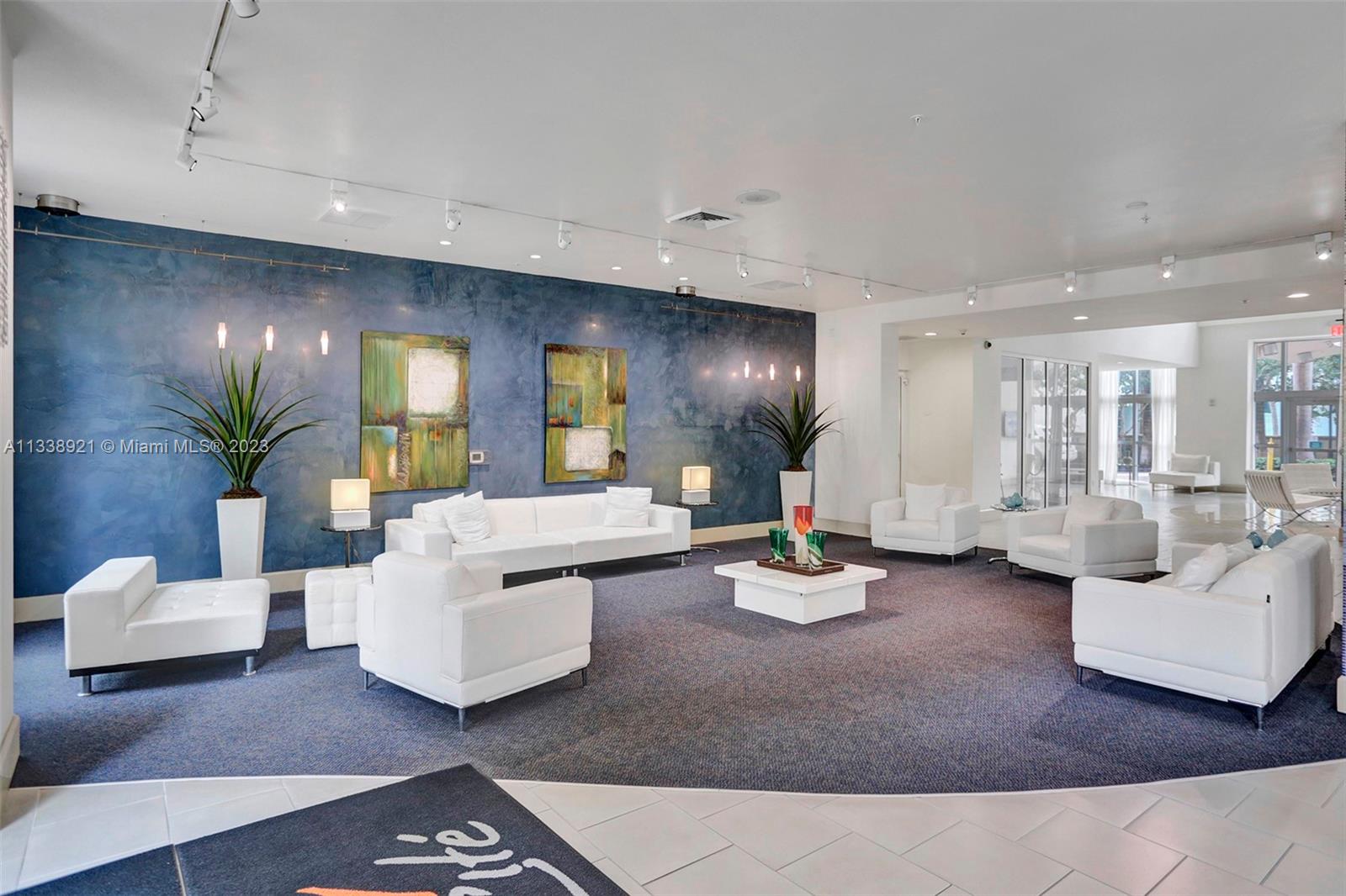 2001 Biscayne Boulevard, Unit 2202 Miami, FL 33137 - Photo 26 of 31 a living room with furniture and white walls