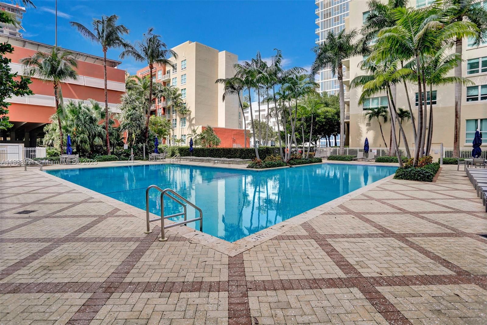 2001 Biscayne Boulevard, Unit 2202 Miami, FL 33137 - Photo 29 of 31 a view of a swimming pool with a patio