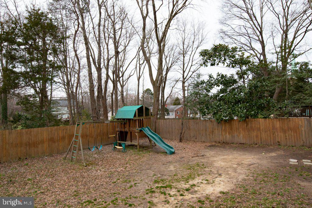 1203 Collingwood Road Alexandria, VA 22308 - Photo 41 of 51 Large, flat, fully fenced yard w/play structure