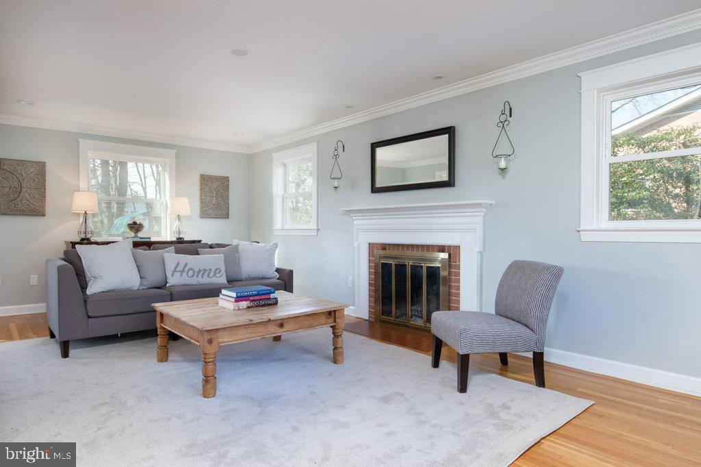 1203 Collingwood Road Alexandria, VA 22308 - Photo 7 of 51 Formal living room with wood-burning fireplace