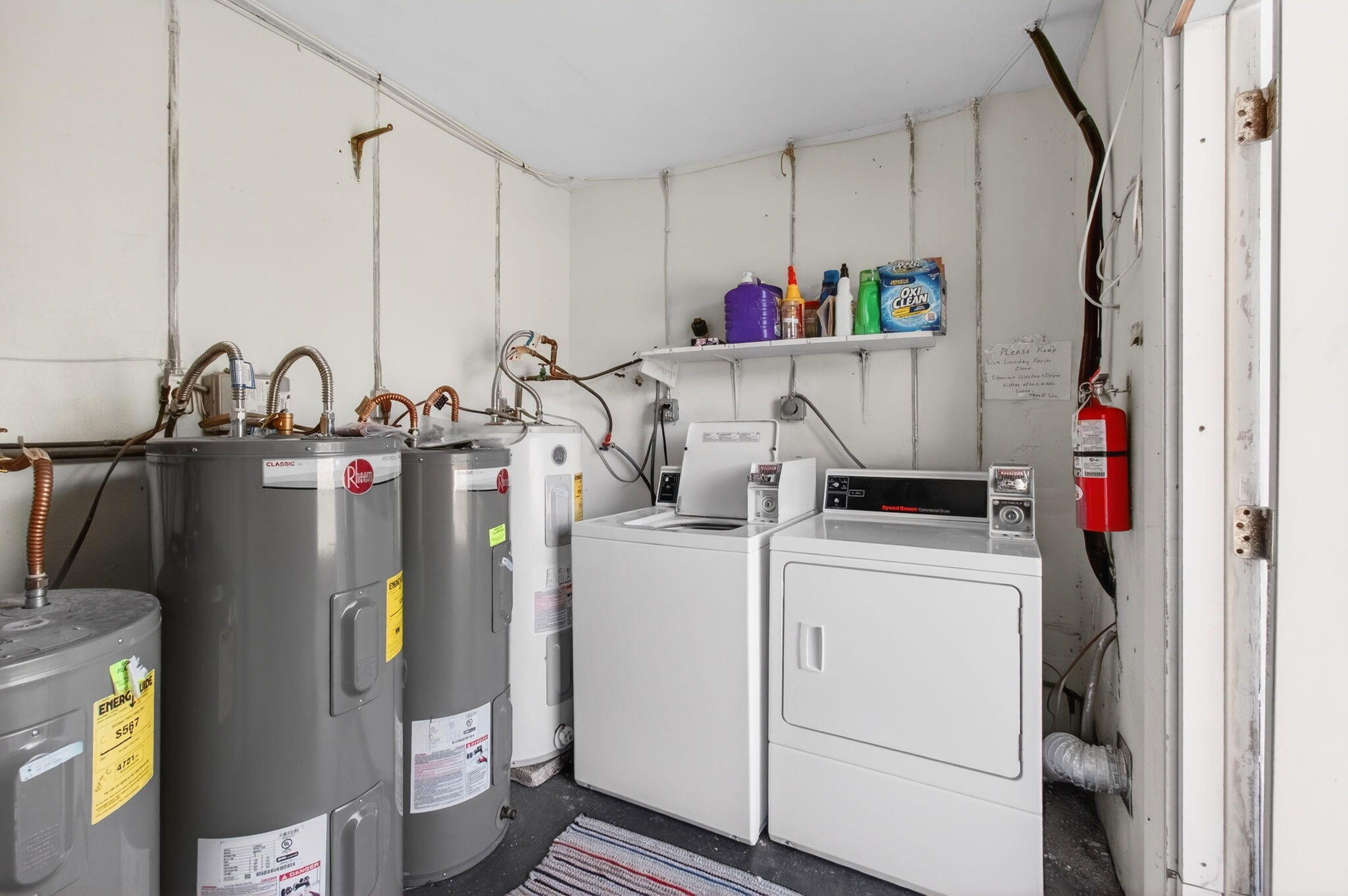 417 High Point Boulevard, Unit D Delray Beach, FL 33445 - Photo 36 of 51 Water tanks and laundry room (2)