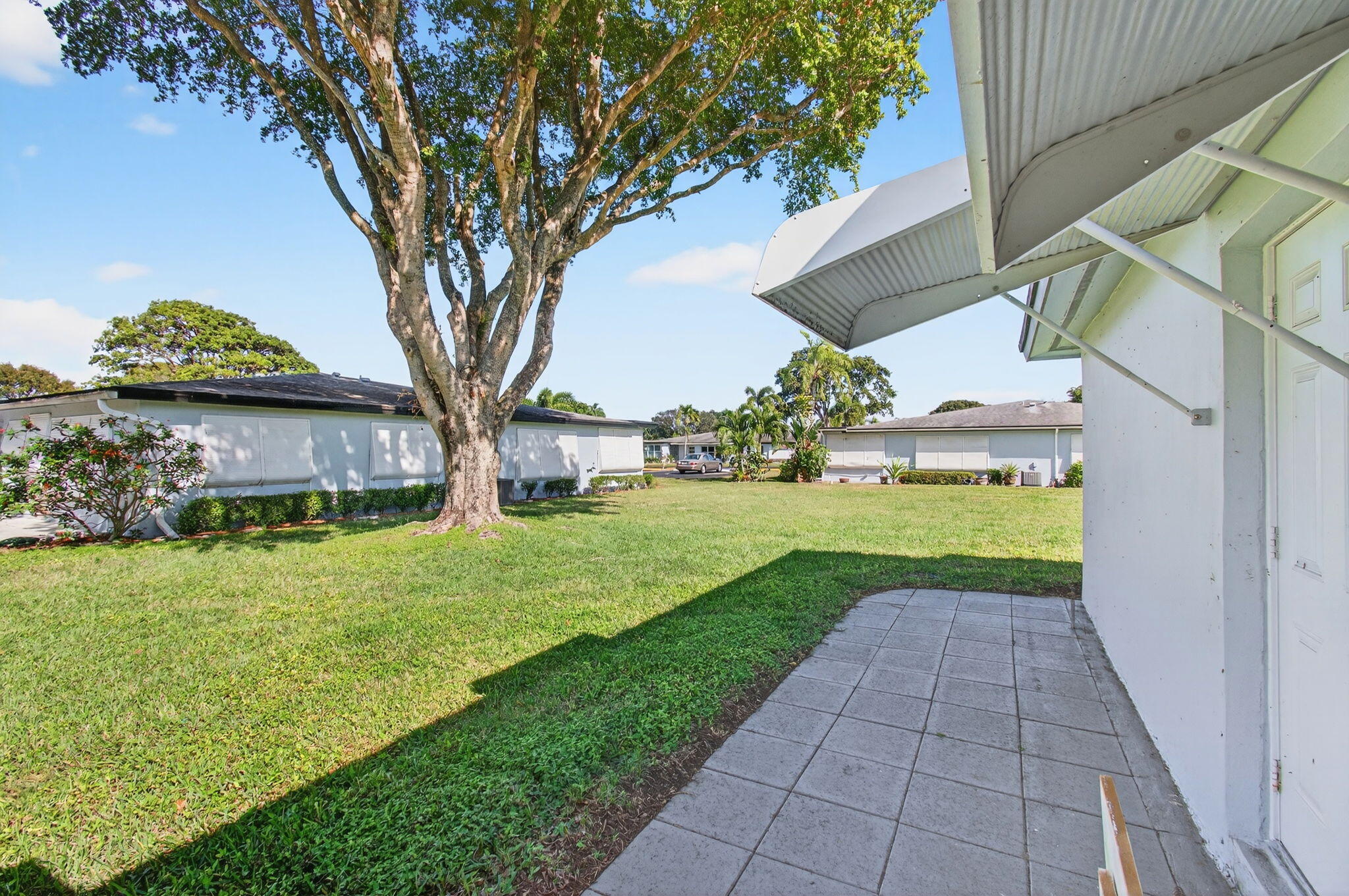 417 High Point Boulevard, Unit D Delray Beach, FL 33445 - Photo 39 of 51 Exterior back yard patio and view (1)