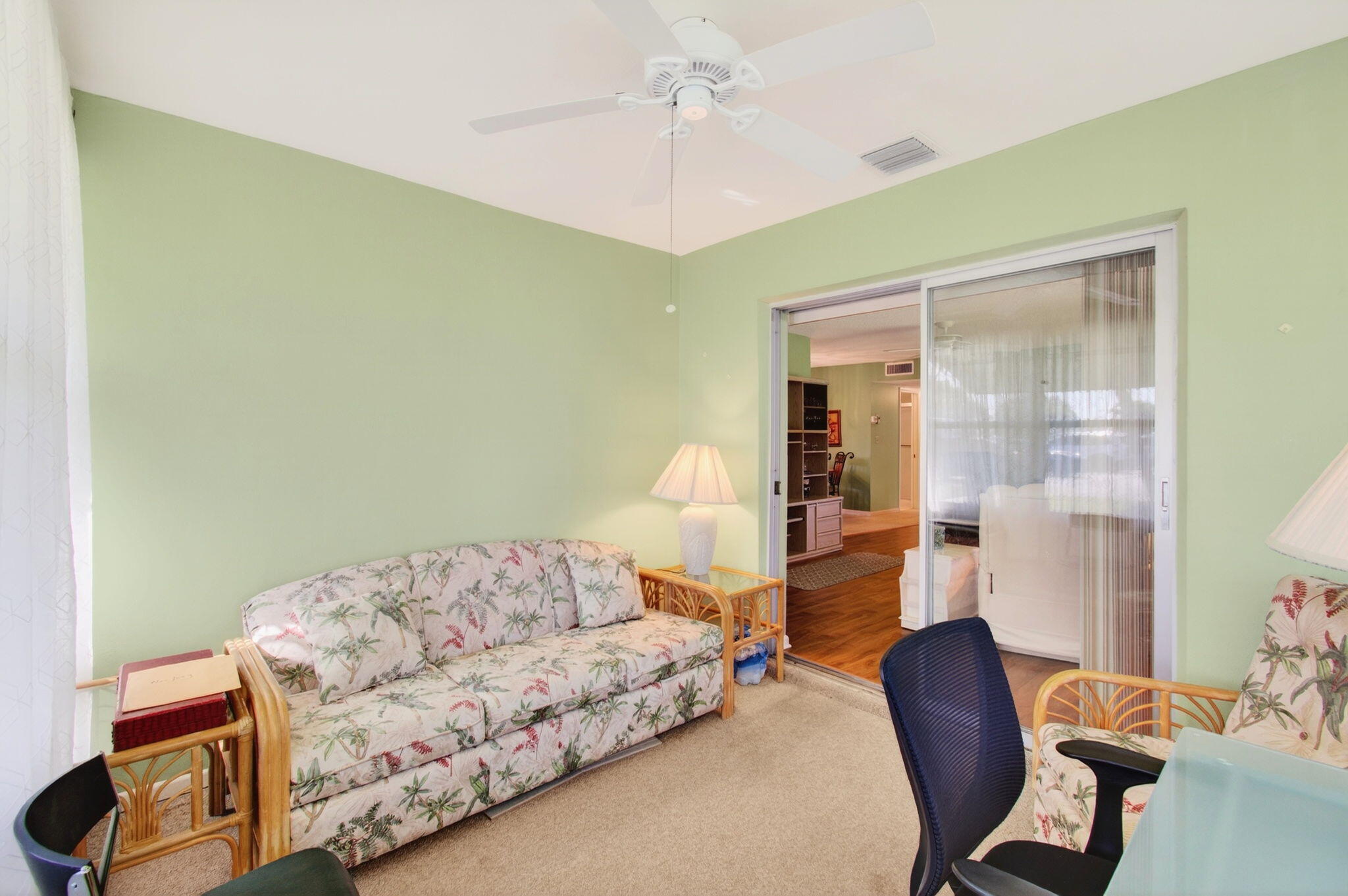 417 High Point Boulevard, Unit D Delray Beach, FL 33445 - Photo 8 of 51 Enclosed Florida room under air (4)