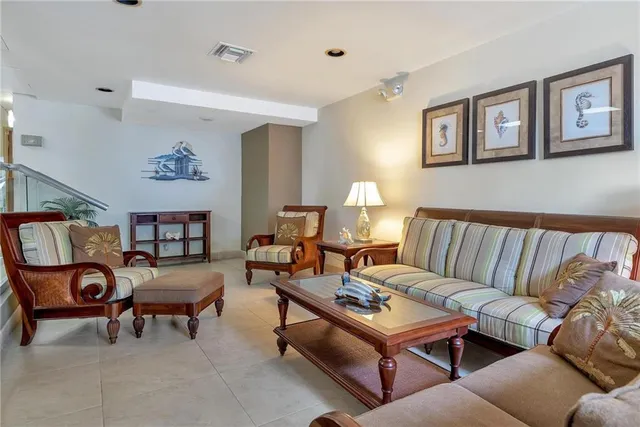 a lobby with furniture and window