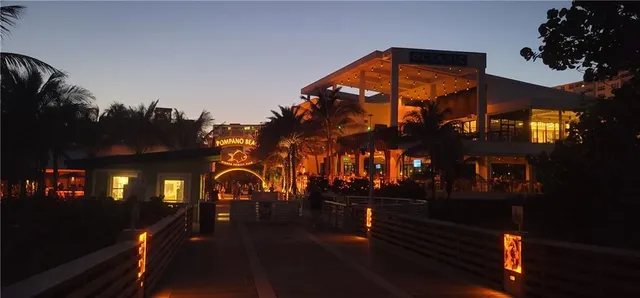 a garden with palm trees
