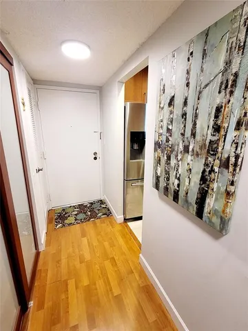 a view of a balcony with furniture