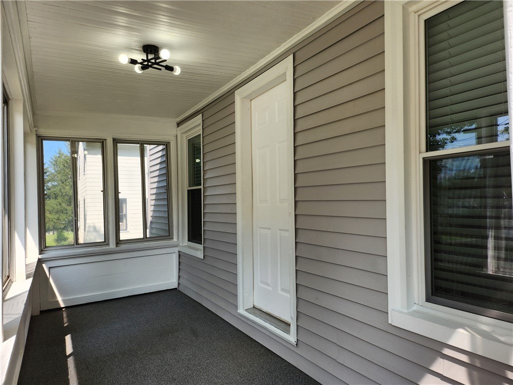 344 Elmgrove Road Greece, NY 14626 - Photo 3 of 28 front porch has large windows and screens