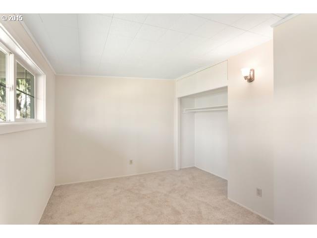 1531 Checketts Road Hood River, OR 97031 - Photo 7 of 16 an empty room with windows and closet