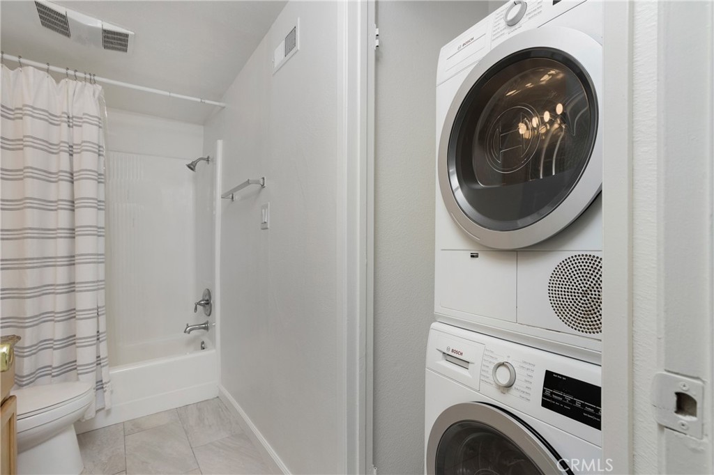 24339 Pasto Road, Unit A Dana Point, CA 92629 - Photo 15 of 28 a view of bathroom with washer and dryer