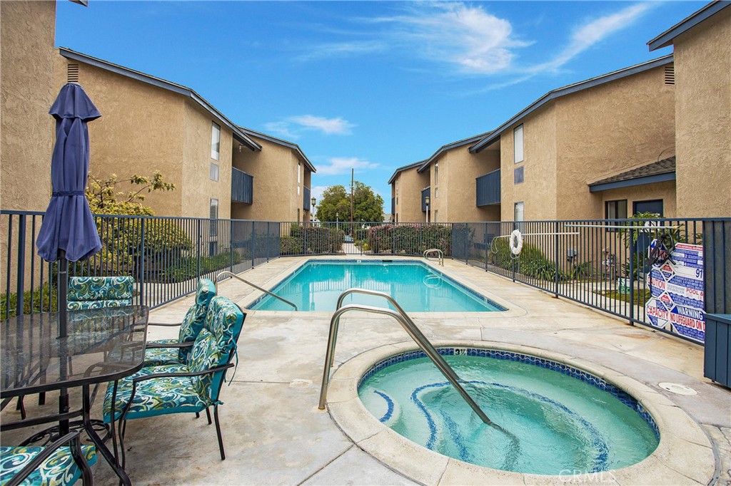 24339 Pasto Road, Unit A Dana Point, CA 92629 - Photo 25 of 28 a house view with a swimming pool and outdoor space