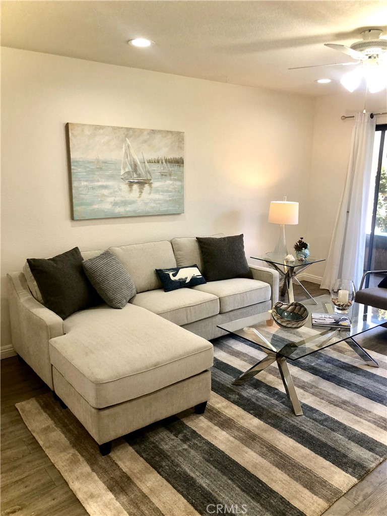 24339 Pasto Road, Unit A Dana Point, CA 92629 - Photo 3 of 28 a living room with furniture