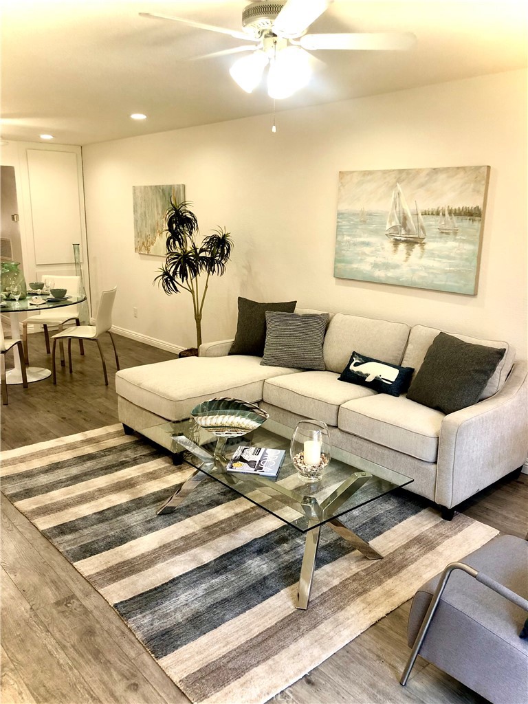 24339 Pasto Road, Unit A Dana Point, CA 92629 - Photo 10 of 28 a living room with furniture and a rug