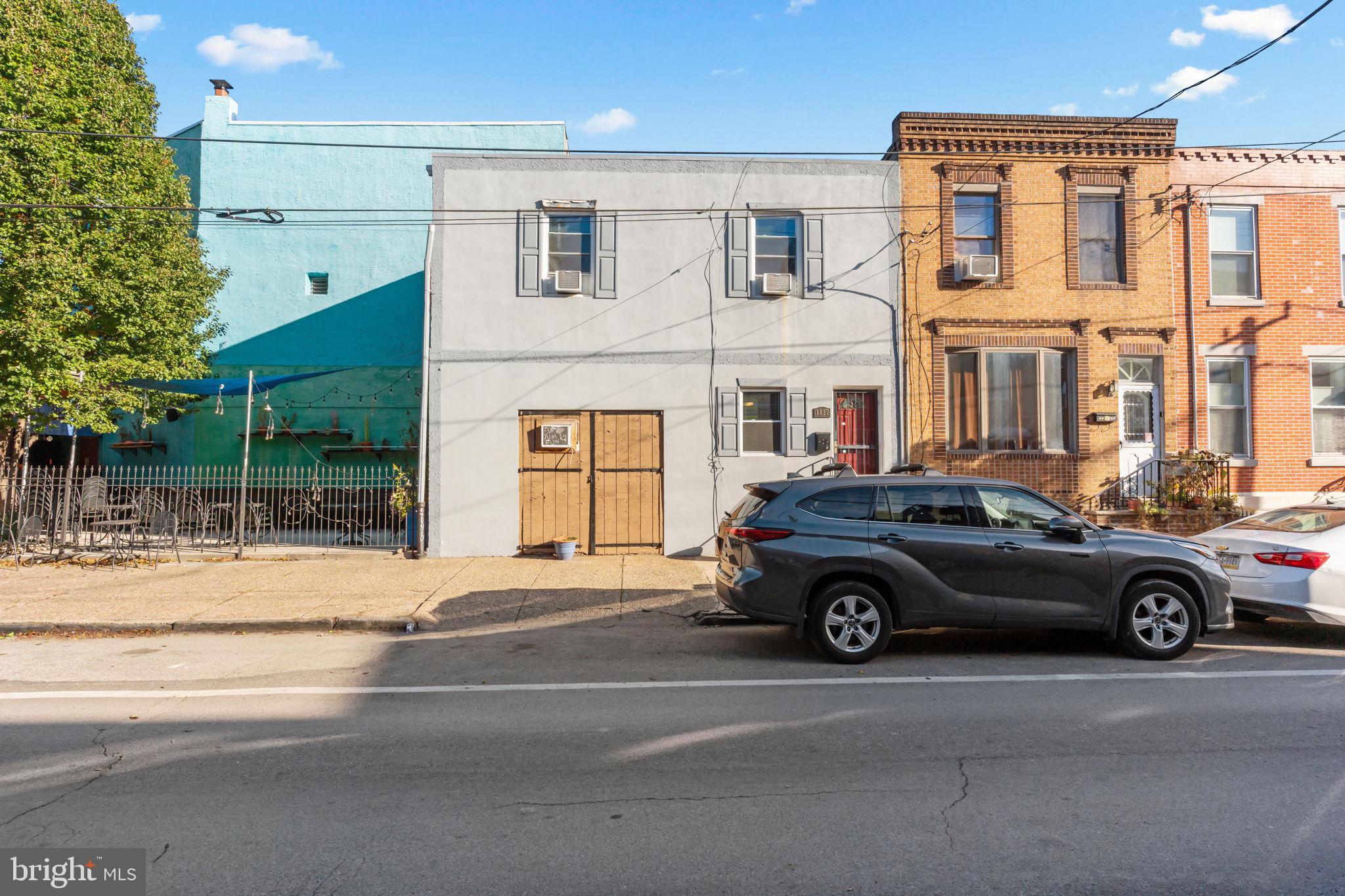 1117 Morris Street Philadelphia, PA 19148 - Photo 21 of 21 a car parked in front of a house