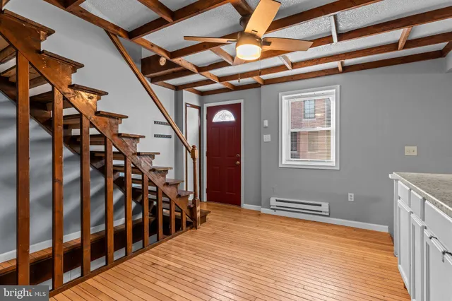 a view of entryway with wooden floor