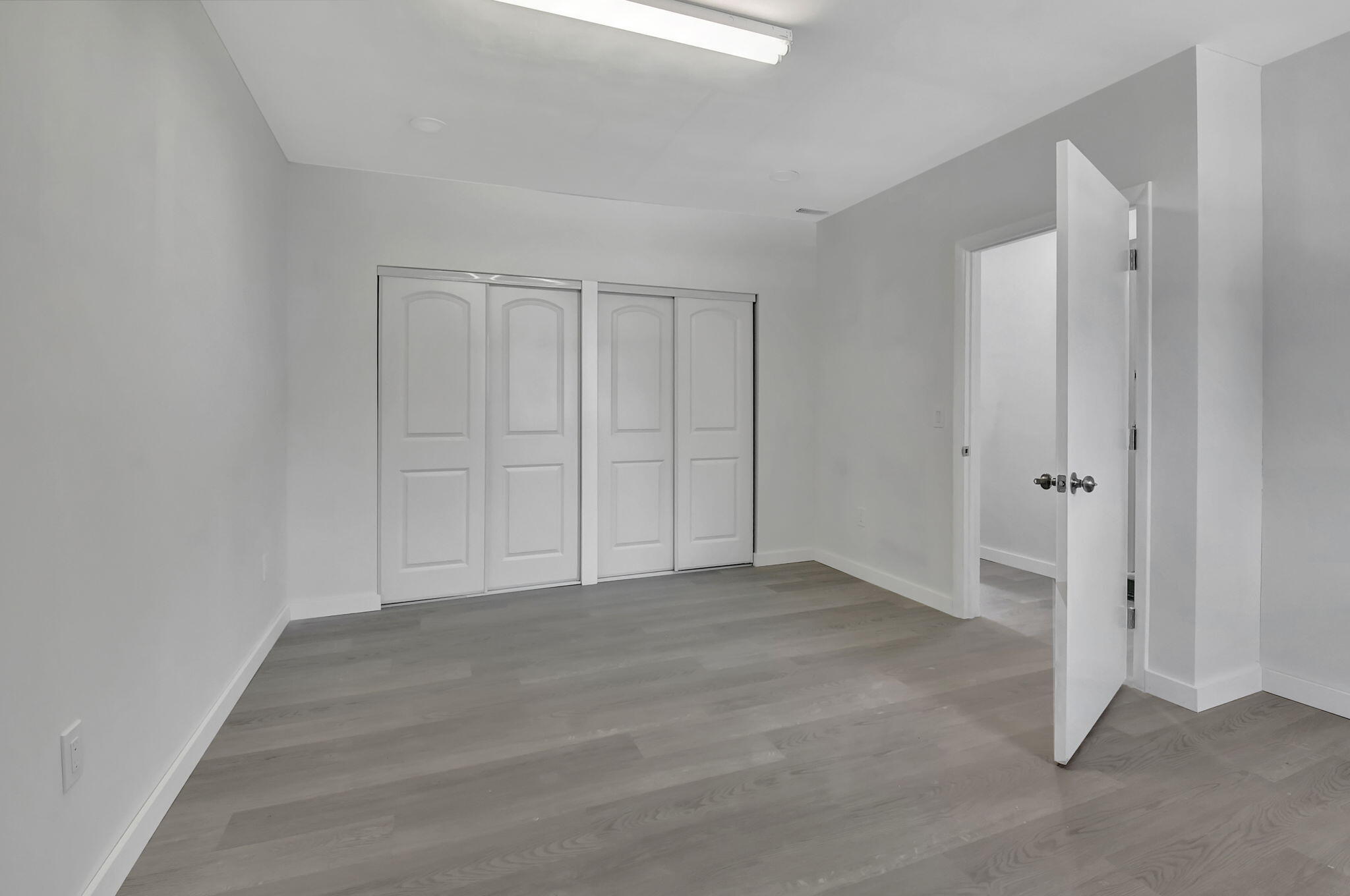 410 Spanish River Boulevard Boca Raton, FL 33431 - Photo 20 of 26 a view of an empty room with closet area