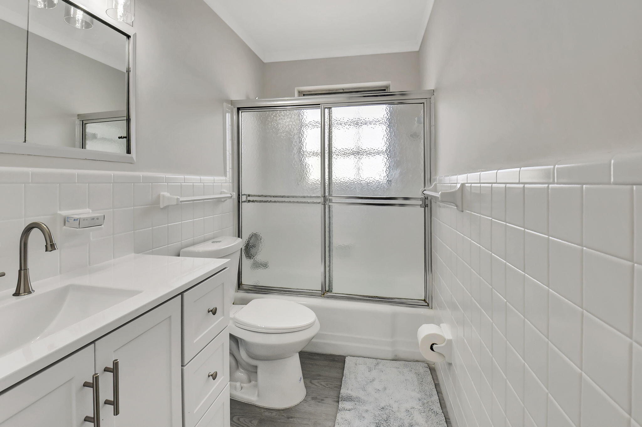 410 Spanish River Boulevard Boca Raton, FL 33431 - Photo 21 of 26 a bathroom with a toilet sink and shower