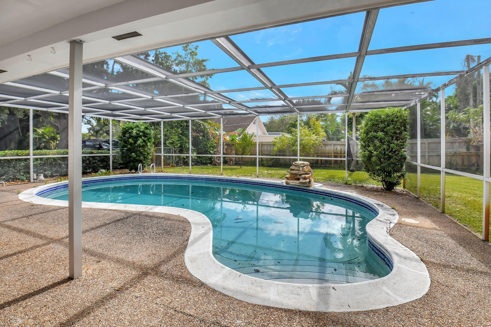 410 Spanish River Boulevard Boca Raton, FL 33431 - Photo 25 of 26 a view of a swimming pool with a patio